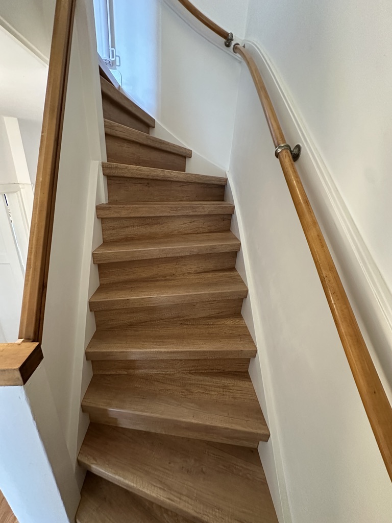 Traprenovatie Den Haag houtlook decor klassiek